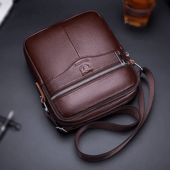 Bolso ejecutivo crossbody de piel marrón para hombre, cierre metálico y correa ajustable