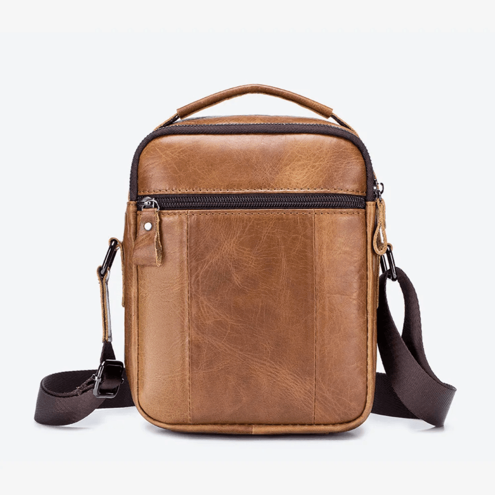 Bolso crossbody de cuero genuino color marrón con correa ajustable estilo urbano masculino